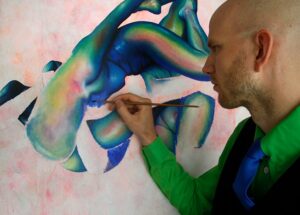 Rick van den Berg working on his painting Devine Energy Supplying Infinitely Revived Ecstasy